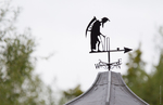 Weather vane on top of the pavilion